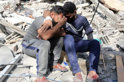 Израилийн цэргүүд тусламжийн бараа авахаар бөөгнөрсөн палестинчууд руу гал нээсний улмаас 104 хүн алагдав