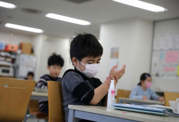 Япон: Дельта хувилбар сургуулийн насныханд хурдацтай тархаж байна